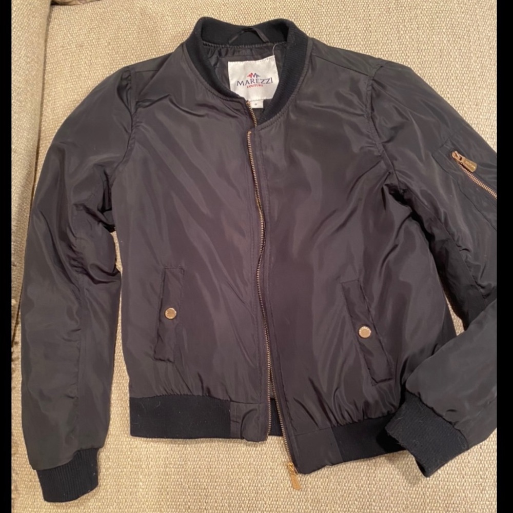 Navy bomber jacket with gold zippers